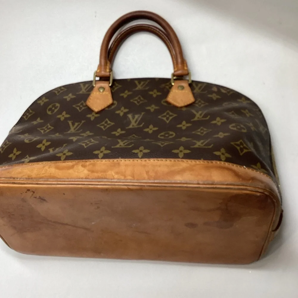 Louis Vuitton Monogram Alma Handbag Brown Coated Canvas Leather